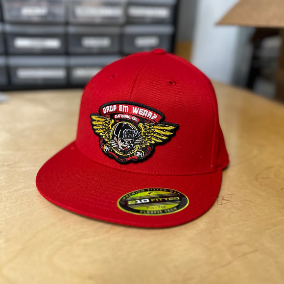 30th ANNIVERSARY RED FLAT BILL FLEX FIT HAT WITH BRIGADE PATCH ON FRONT