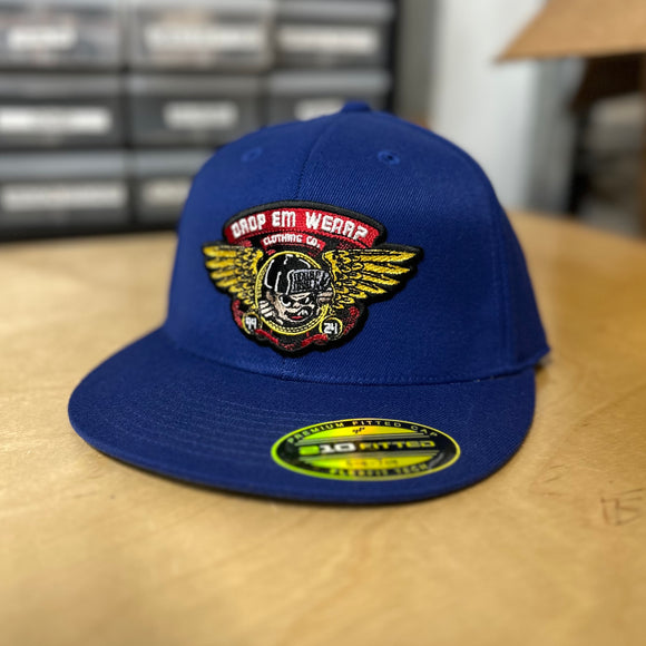 30th ANNIVERSARY ROYAL BLUE FLAT BILL FLEX FIT HAT WITH BRIGADE PATCH ON FRONT