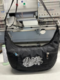 Crescent shaped hobo bag with adjustable strap