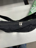 Crescent shaped hobo bag with adjustable strap