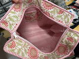 Zipper top flowered tote