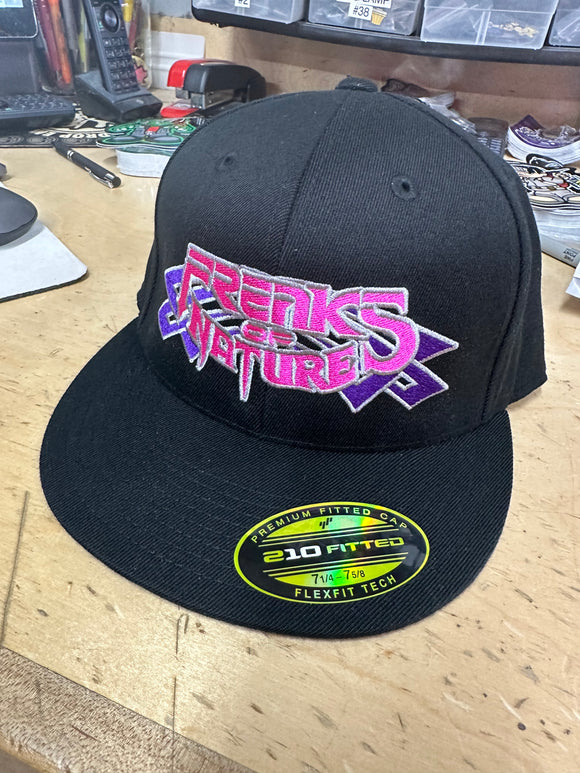 NOVEMBER HAT OF THE MONTH BLACK FLAT BILL FITTED HAT WITH PURPLE TRIBALS WITH PINK FON AND SILVER OUTLINE