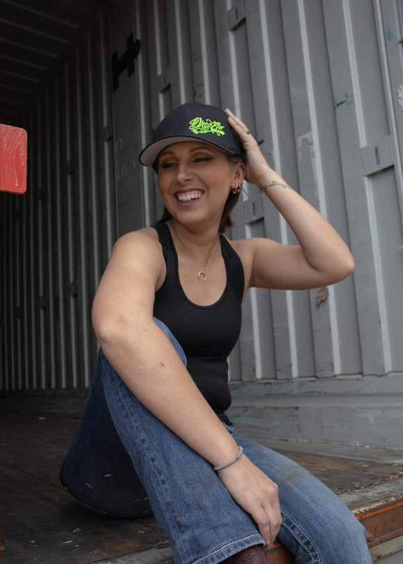 BLACK CURVED BILL FLEX FIT HAT WITH LIME TATTOO SCRIPT LEFT PANEL