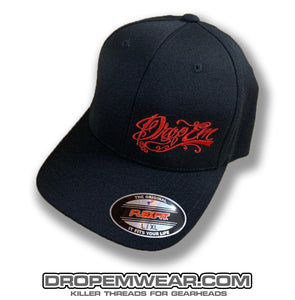BLACK CURVED BILL FLEX FIT HAT WITH RED TATTOO SCRIPT LEFT PANEL