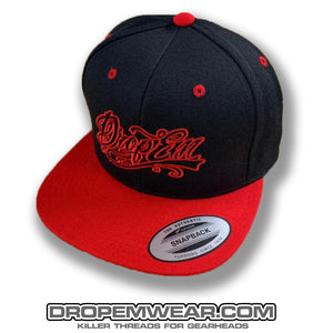 BLACK FLAT BILL SNAP BACK WITH RED BILL AND RED TATTOO SCRIPT LOGO
