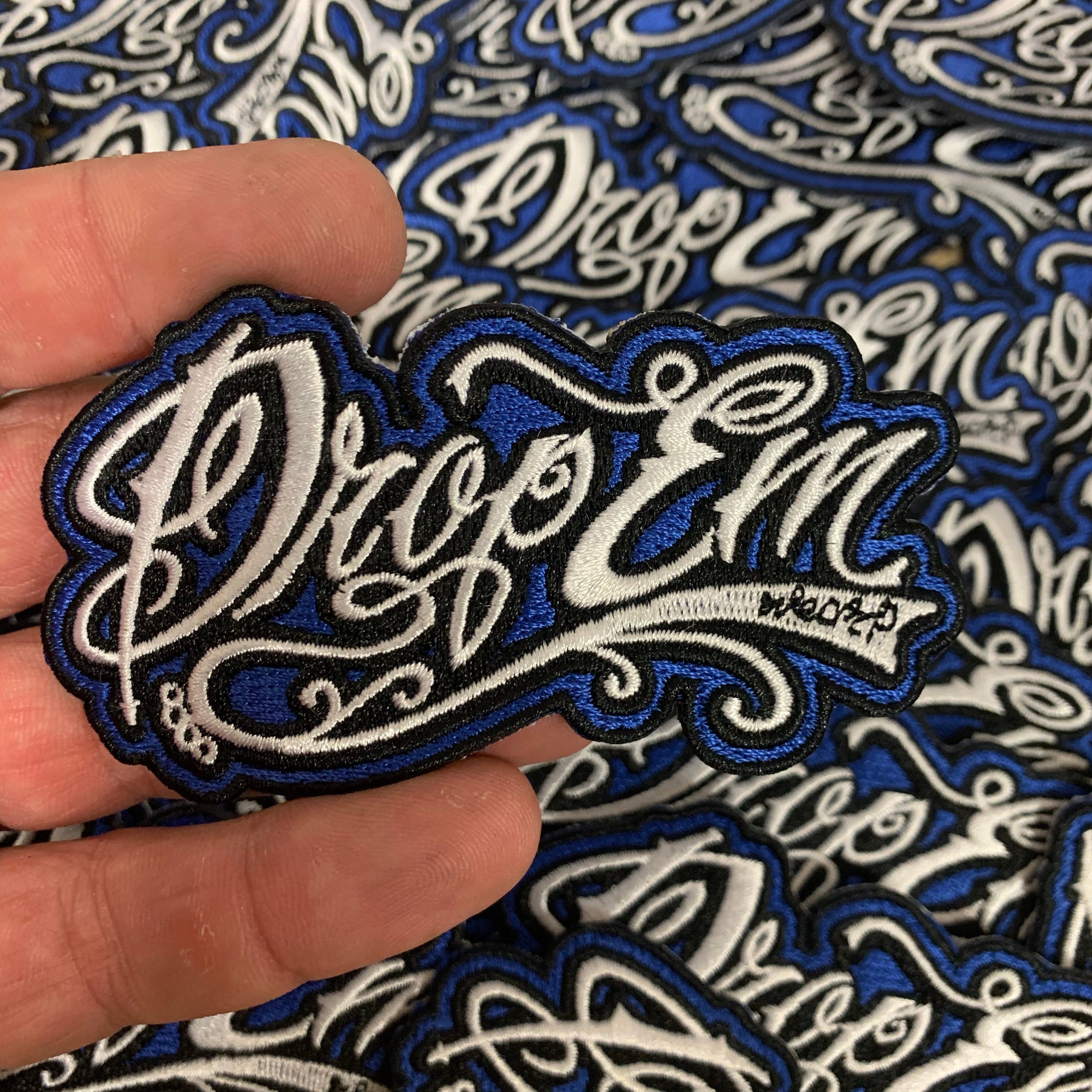 DROP EM WEAR LOGO PATCH 2X4 BLUE